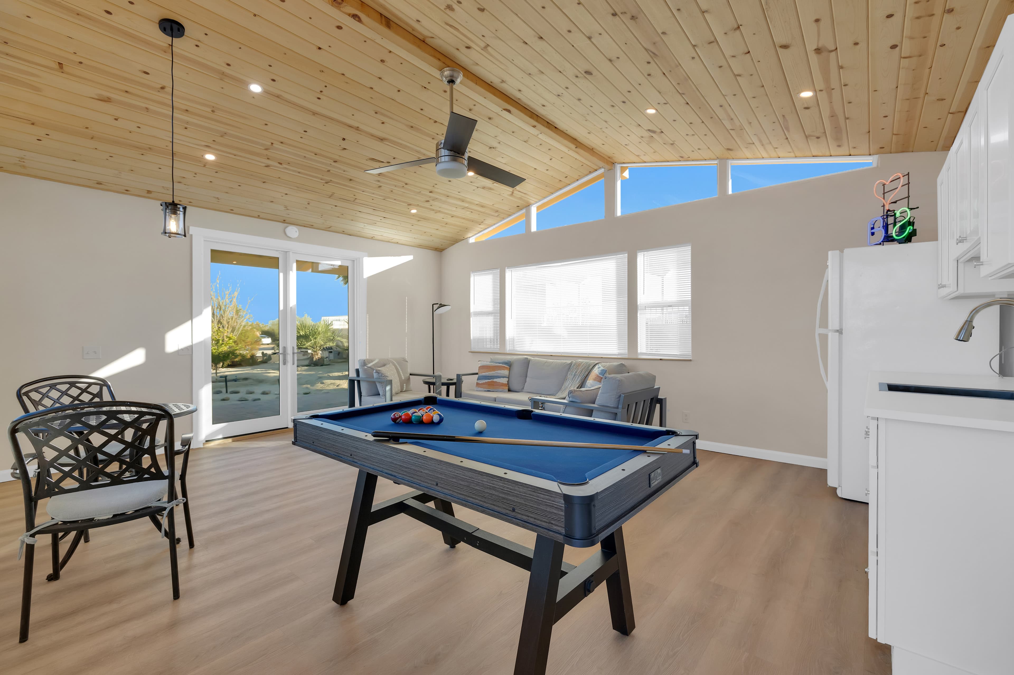The Clubhouse features a mini-split, full-size refrigerator, complimentary ice, sink, games and playing cards